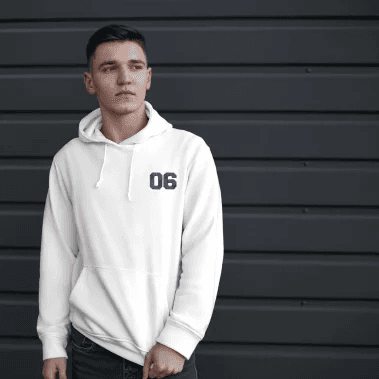 Custom embroidered white hoodie posed by a man qikink