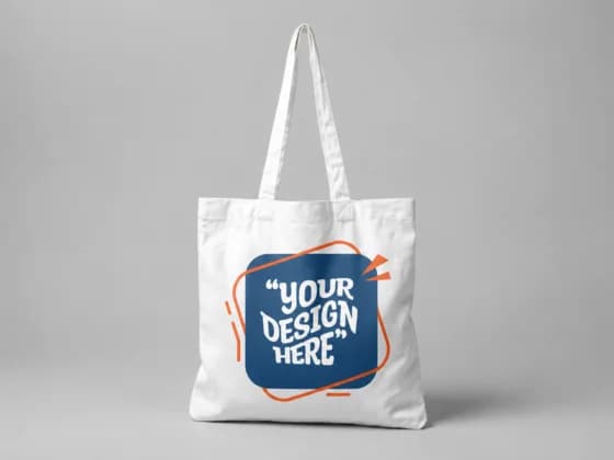 White tote bag with "your design here"