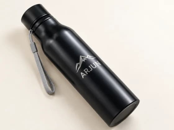 Name and logo laser engraved on a steel bottle